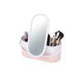 A portable makeup organizer with LED mirror, featuring compartments with makeup brushes visible, in a pink and white color scheme.